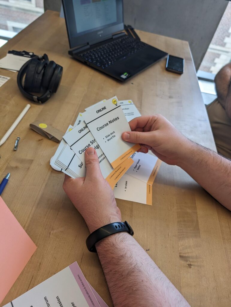 Photo showing hands holding cards from the Blended Learning Deck