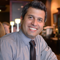 Headshot image of Dr. Arash Shahi